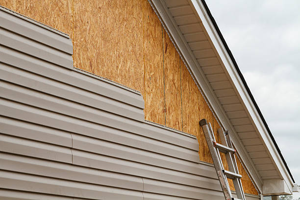 Professional Storm Damage Siding Repair technician working in Gold Hill, NC